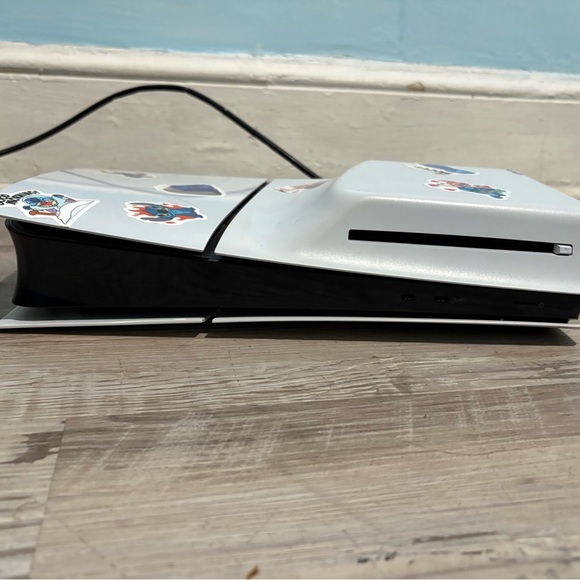 Sony Gray Console with Character Stickers